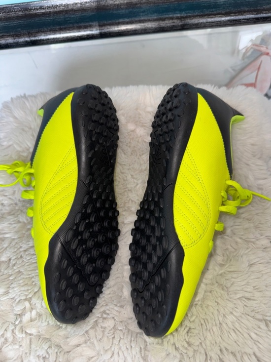 Neon  green and black Adidas soccer sneakers for men or women